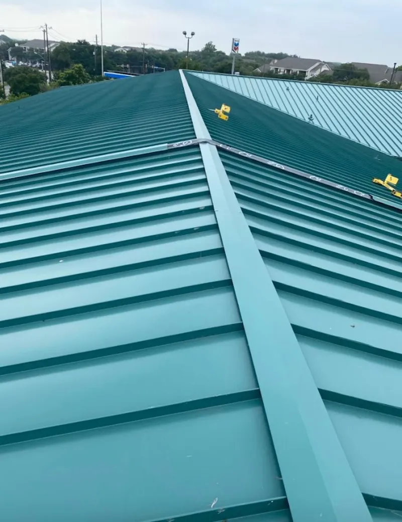 Green commercial metal roof ridge and valley for Metal Roof Repair in McCalla