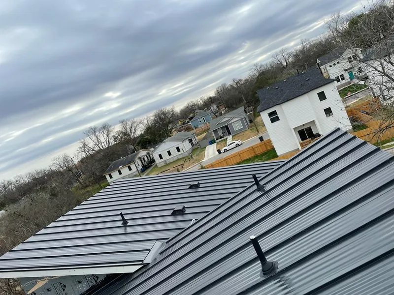 Standing seam metal roof panels with vents for Skylight Repair in McCalla
